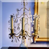 D02. One of a pair of antique girandoles candelabras with hanging clear and amethyst crystals. 